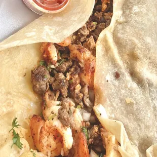 &quot;Surf &apos;n Turf&quot; style burrito, meaty-loaded w/ steak &amp; shrimp, beans, rice, cilantro &amp; onion. Fantastic!