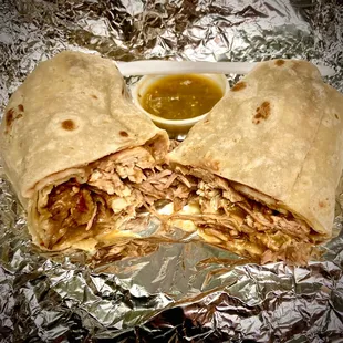 Chile Verde Burrito w/ extra green salsa on side. Nice and large. I most highly recommend.