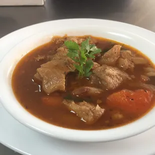 a bowl of stew with meat and vegetables