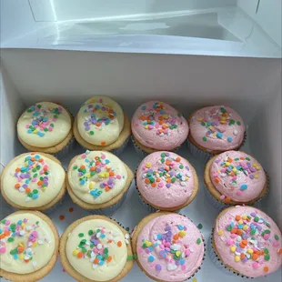 Custom ordered lemon and strawberry buttercream frosted cupcakes