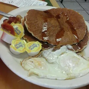 Pancakes with 2 eggs and bacon 4.95