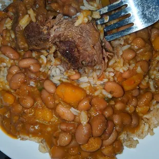 Beef stew with rice and beans, beef is a bit dry.
