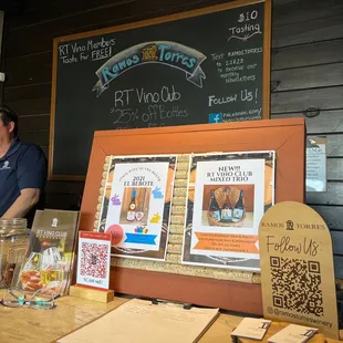 a man standing behind the counter