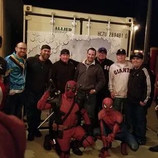 a group of people dressed as deadpool