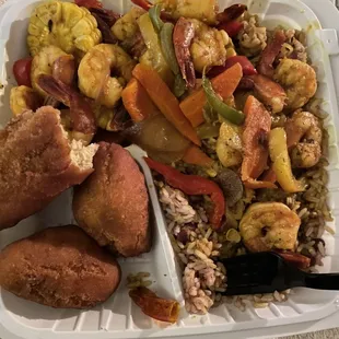Curried shrimp, rice and peas, festival, fried dumplings