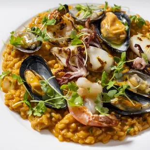 a plate of seafood and rice