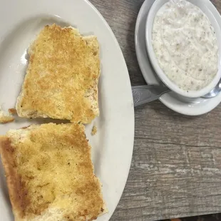 Biscuit with a side of gravy