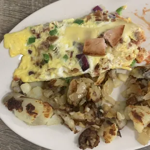 Omelet Bacon, pepper Jack cheese, peepers and onions.