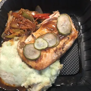 Pacific Salmon to go. Unseasoned salmon with a little glaze thrown on top (with pickles?!) and Green wasabi mashed potatoes. Tasteless.