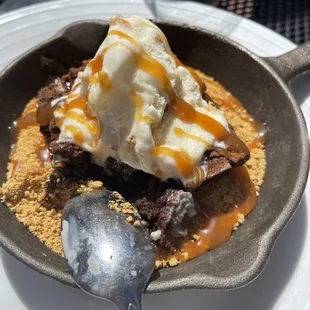 a dessert with ice cream and caramel