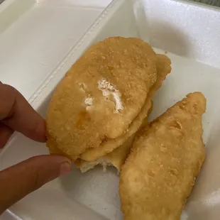 How do u mess up tenders don't looked cooked at all &amp; white stuff on em that's not the chicken meat smh