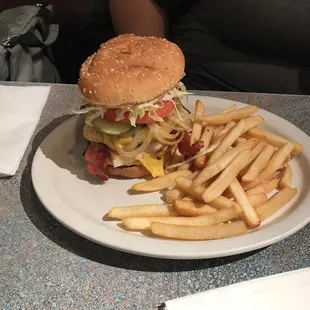 The imatator with bacon and a side of fries