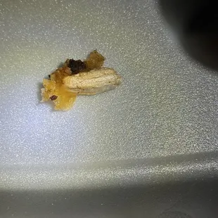 A piece of wood in the potato skins...