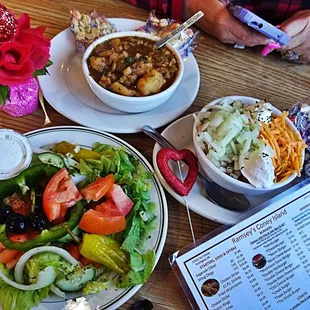 a plate of salad and a bowl of soup