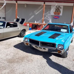 two classic muscle cars