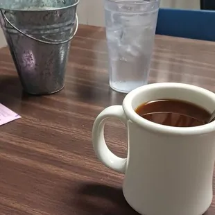 Coffee water and butter and creamer in a bucket