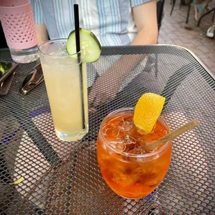 Aperol spritz and cucumber collins