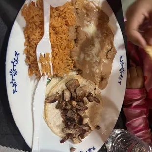 Simple meal with chicken taco, carne asada plate