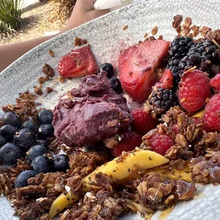 Partially eaten açaí bowl.