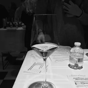 a glass of wine on a table