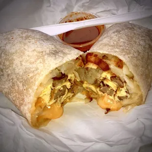 Breakfast burrito w/ sausage, eggs, melty cheese &amp; hash browns. Classic good, I recommend.