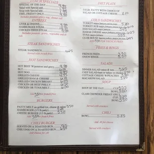 a menu on a wooden table