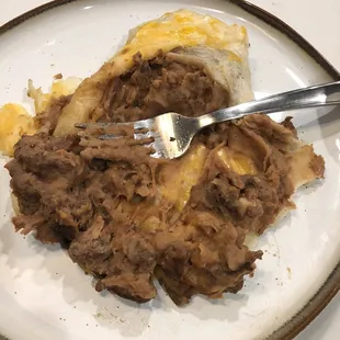 Sad excuse of a burrito, not fit for any human to consume. Blown apart nightmare