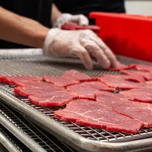 Preparing house made beef jerky!