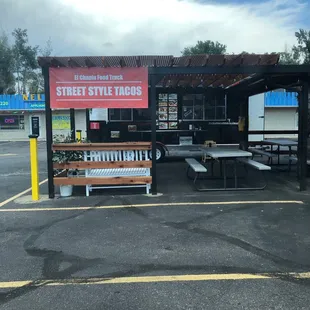 Next to ranch Foods Direct there is street taco stand.   Good tacos.