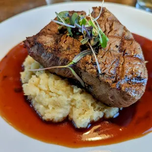 a steak and mashed potatoes