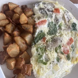 Egg white omelette with home fries on the side. I also got salsa on the side but it's not pictured here.
