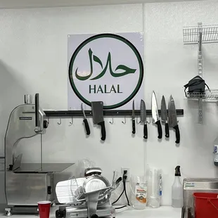 a kitchen counter with a sign that says hal