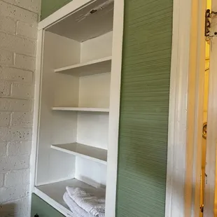 Shelves were kind of nice but why was there a towel just sitting there? Towels were folded but dirty.