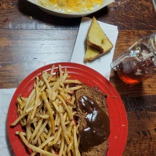 White Mac and Cheese with Texas garlic bread Today's special: Meatloaf (homemade) with fresh cut fries.  Delicious!!