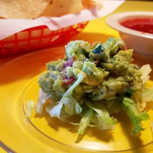Fresh, yummy guac and very tasty, hot salsa