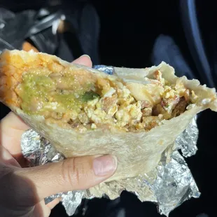 Bacon Breakfast Burrito +Potatoes! Enjoy with green salsa