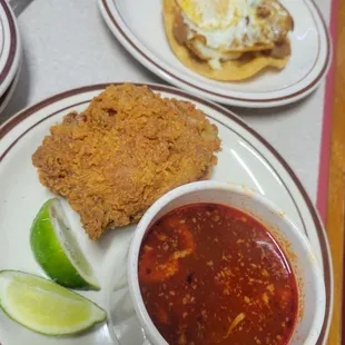 Menudo, fried chicken, tiny bean/cheese papusa