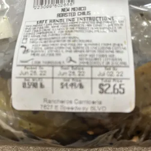 Grilled chilies by the register.