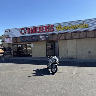 The front with the gray ghost parked out front