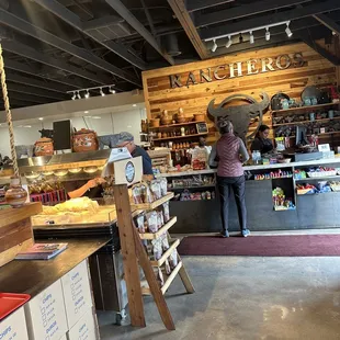 a couple of people in a store