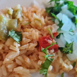 Rice with cilantro and onions.