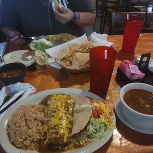 Burrito, a taco, rice, beans, flautas