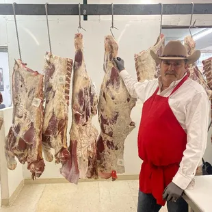 a man in a red apron