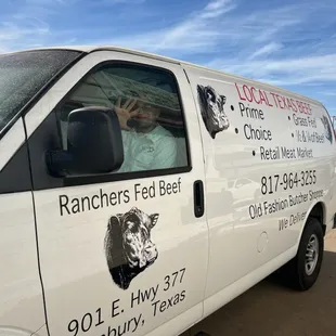 a white van parked on the side of the road