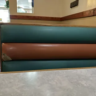 Older booth that is a bit worn.