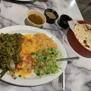 Carne asada con nopales. Comes with a cheese enchilada too!