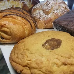 Peanut butter cookies, gluten free brownies, croissant and danish.