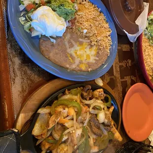 a variety of mexican food on a table