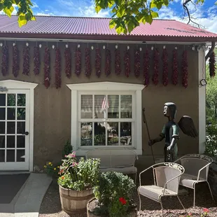 Ristras align the roof line.  So gorgeous!