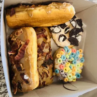 My oldest got a fruity pebbles donut in a separate bag to go, these were all just $15